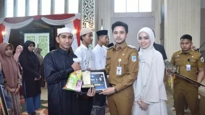 Baznas dan TP PKK Kota Jambi Berikan Bantuan kepada 750 Anak Yatim dan Dhuafa